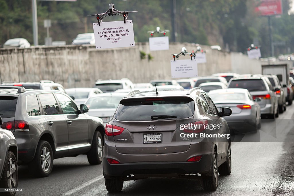 Uber Technologies Inc. drones advertise uberPOOL above traf