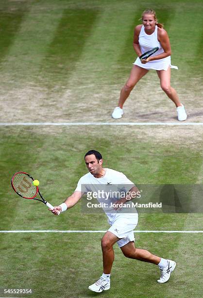 Scott Lipsky of The United States and Alla Kudryavtseva of Russia in action during the Mixed Doubles Quarter Finals match against Heather Watson of...
