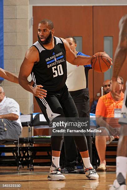 Arinze Onuaku of the Orlando Magic White drives to the basket against the Detroit Pistons during the Orlando Summer League Championship Game on July...