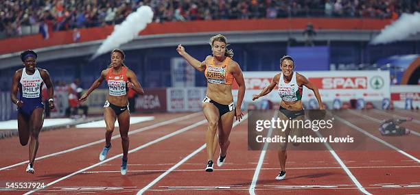 Dafne Schippers of the Netherlands wins the Womens 100m Final during day three of the 23rd European Athletics Championships at Olympic Stadium on...