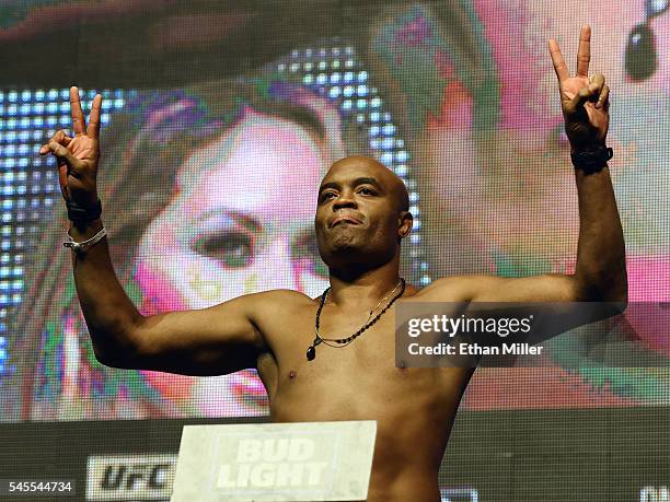 Mixed martial artist Anderson Silva poses on the scale during his weigh-in for UFC 200 at T-Mobile Arena on July 8, 2016 in Las Vegas, Nevada. Silva...