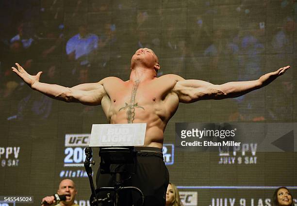 Mixed martial artist Brock Lesnar poses on the scale during his weigh-in for UFC 200 at T-Mobile Arena on July 8, 2016 in Las Vegas, Nevada. Lesnar...