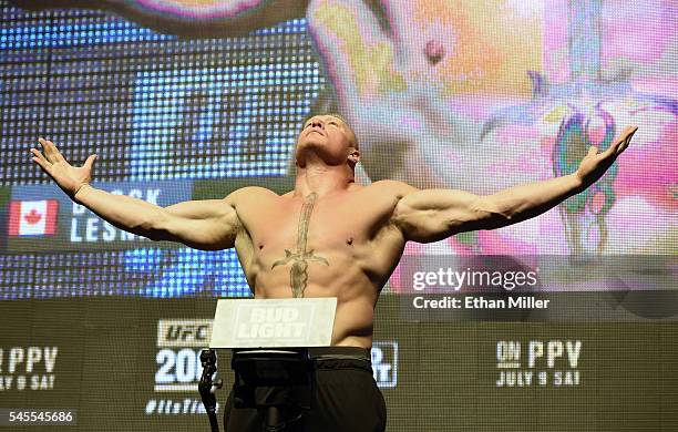 Mixed martial artist Brock Lesnar poses on the scale during his weigh-in for UFC 200 at T-Mobile Arena on July 8, 2016 in Las Vegas, Nevada. Lesnar...