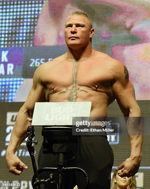 Mixed martial artist Brock Lesnar poses on the scale during his weigh-in for UFC 200 at T-Mobile Arena on July 8, 2016 in Las Vegas, Nevada. Lesnar...