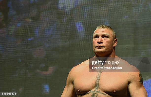 Mixed martial artist Brock Lesnar poses on the scale during his weigh-in for UFC 200 at T-Mobile Arena on July 8, 2016 in Las Vegas, Nevada. Lesnar...