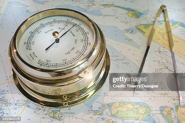 barometer, compass, map - a picture of a barometer foto e immagini stock