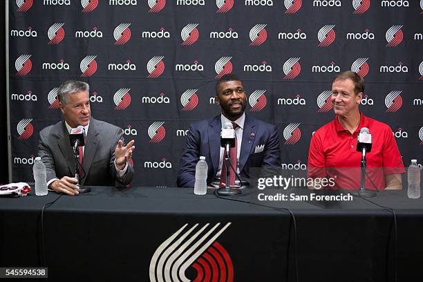 Festus Ezeli of the Portland Trail Blazers is introduced to the media by team General Manager Neil Olshey and Head Coach Terry Stotts July 8, 2016 at...