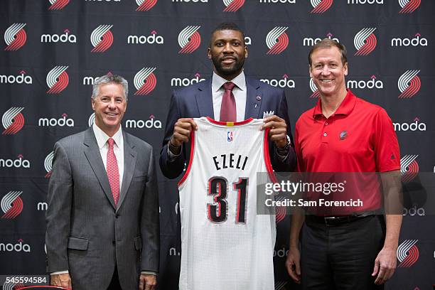 Festus Ezeli of the Portland Trail Blazers is introduced to the media by team General Manager Neil Olshey and Head Coach Terry Stotts July 8, 2016 at...