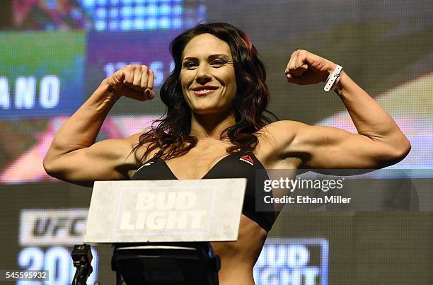Mixed martial artist Cat Zingano poses on the scale during her weigh-in for UFC 200 at T-Mobile Arena on July 8, 2016 in Las Vegas, Nevada. Zingano...