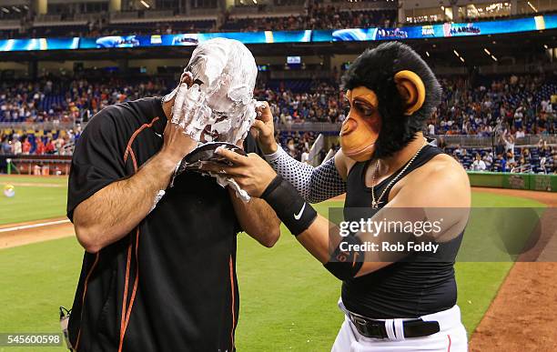 Miguel Rojas covers Jose Fernandez of the Miami Marlins with shaving cream after the game against the Cincinnati Reds at Marlins Park on July 8, 2016...