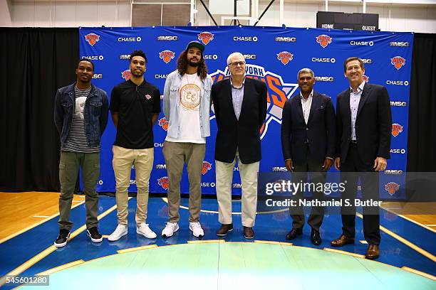 Brandon Jennings, Courtney Lee, and Joakim Noah poses with New York Knicks President Phil Jackson, General Manager Steve Mills, and Head Coach Jeff...
