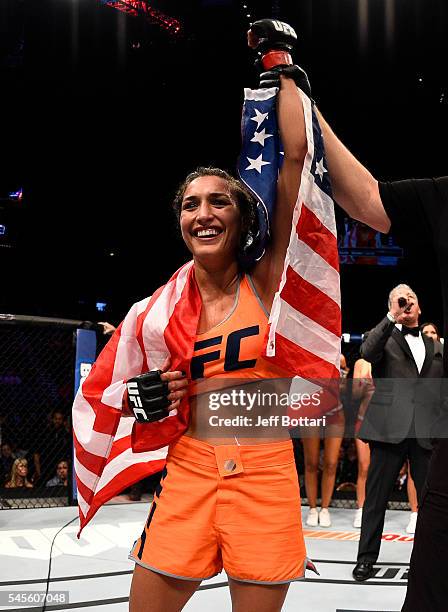 Tatiana Suarez celebrates after her submission victory over Amanda Cooper in their women's strawweight bout during The Ultimate Fighter Finale event...