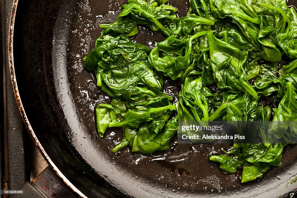 Fresh sauted spinach on a pan