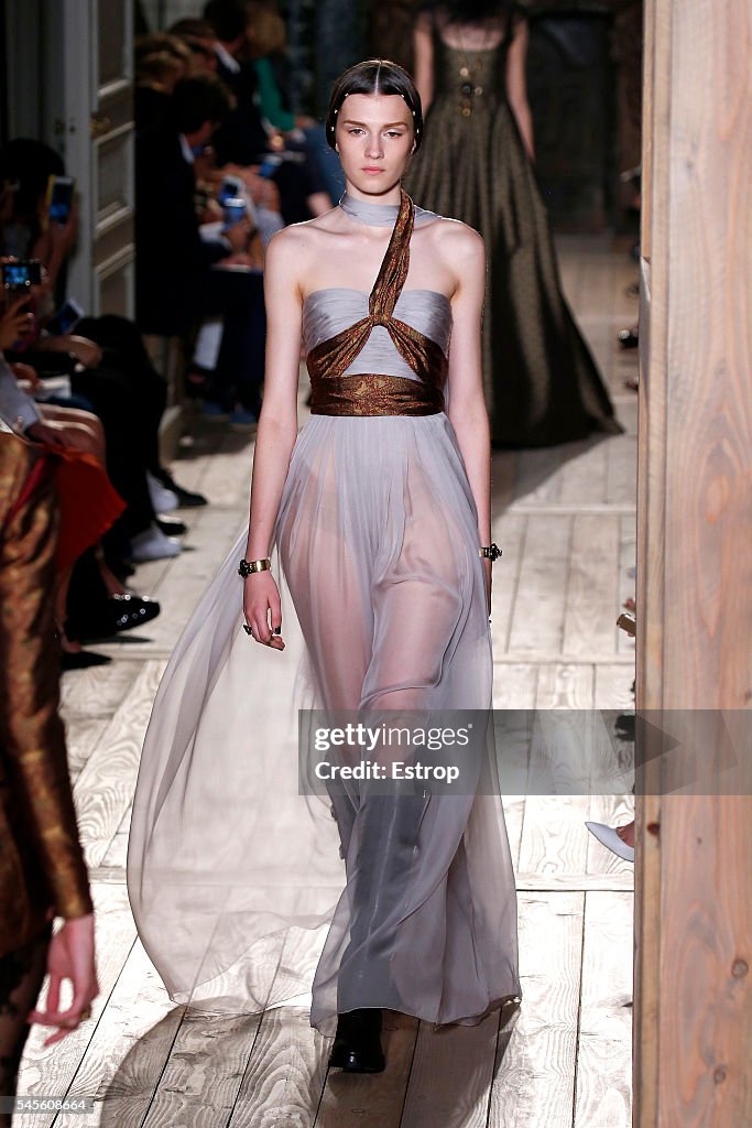 A model walks the runway during the Valentino designed by Pier
