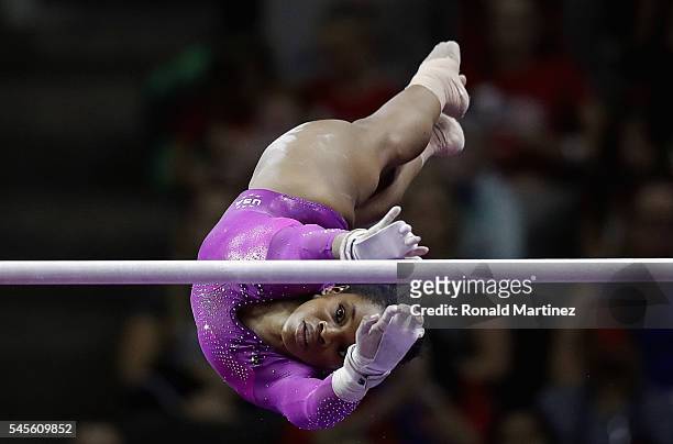 Gabrielle Douglas competes on the uneven bars during day 1 of the 2016 U.S. Olympic Women's Gymnastics Team Trials at SAP Center on July 8, 2016 in...