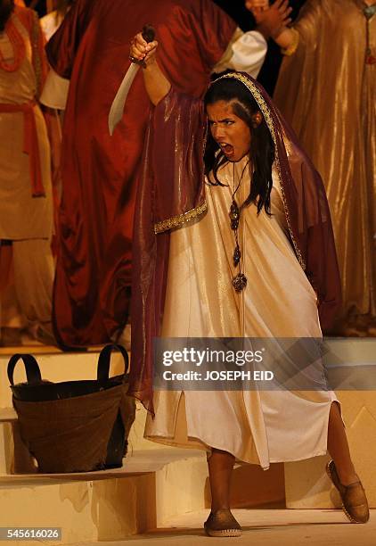 An actress performs in "Antar and Abla" the first Lebanese opera in Arabic to be completed and performed in the region at the theatre of the Casino...