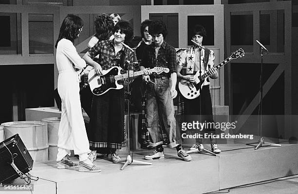 Bay City Rollers with singer Alan Merrill of the band Arrows appearing on 'Arrows' TV Show, Granada TV, Quay Street Studios, Manchester, United...