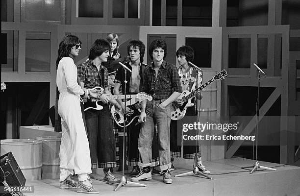 Bay City Rollers with singer Alan Merrill of the band Arrows appearing on 'Arrows' TV Show, Granada TV, Quay Street Studios, Manchester, United...