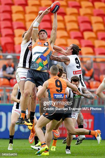 Jonathon Patton of the Giants marks the ball during the round 14 AFL match between the Greater Western Sydney Giants and the Carlton Blues at...