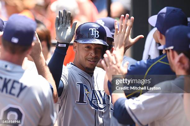 Desmond Jennings of the Tampa Bay Rays celebrates a scoring a run during a baseball game against the Baltimore Orioles at Oriole Park at Camden Yards...