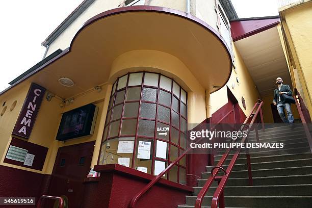 This picture taken on June 30, 2016 shows an old cinéma built in rammed earth in "La Croix Rousse" neighbourhood in Lyon, southeastern France. / AFP...