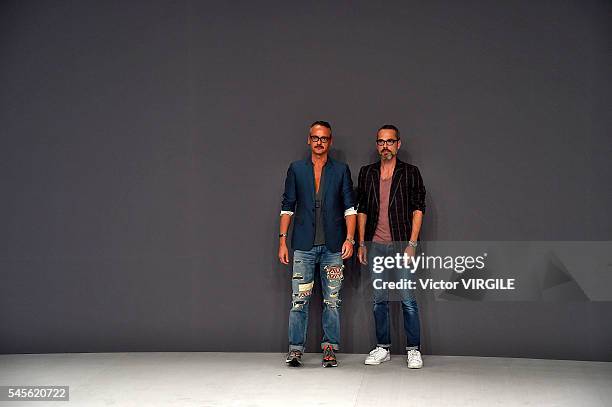 Fashion designers Viktor Horsting and Rolf Snoeren walk the runway during the Viktor & Rolf Haute Couture Fall/Winter 2016-2017 show as part of Paris...