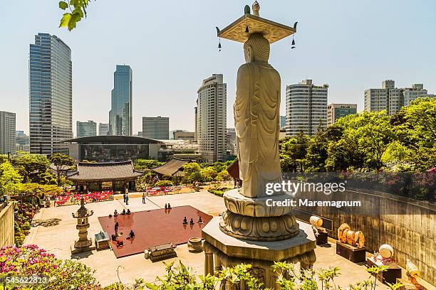 bongeunsa temple, statue of buddha of the future - seoul stockfoto's en -beelden