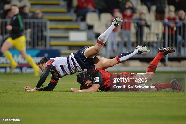 Matt Todd of the Crusaders dives over to score a try during the round 16 Super Rugby match between the Crusaders and the Rebels at AMI Stadium on...