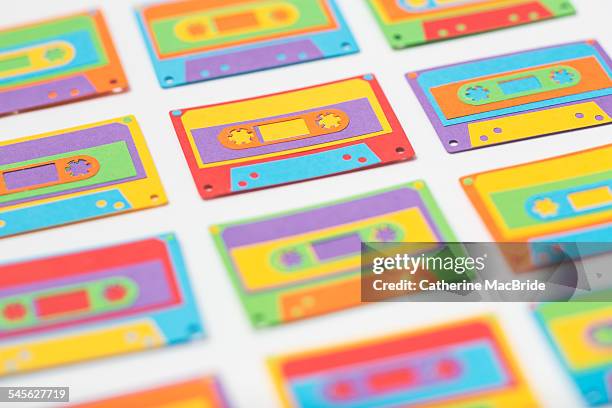 rainbow paper-cut cassette tapes... - catherine macbride stock pictures, royalty-free photos & images