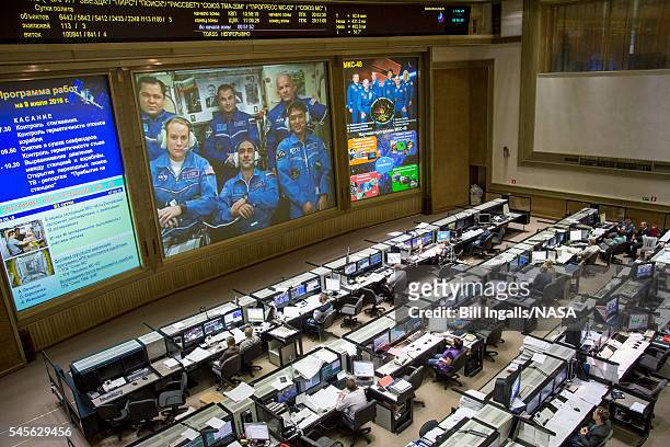 In this handout provided by NASA,Expedition 48 Flight Engineers Oleg Skripochka, top left, and Alexey Ovchinin of Roscosmos, top center, along with...