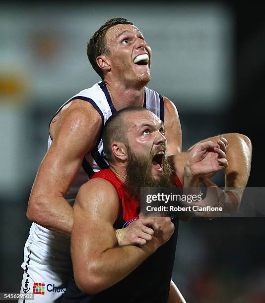 Max Gawn of the Demons is challenged by Jonathon Griffin of the Dockers during the round 16 AFL match between the Melbourne Demons and the Fremantle...