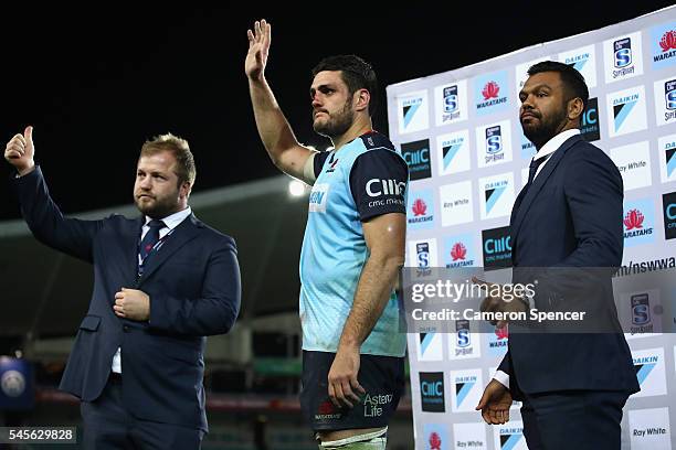 Retired Waratah, Benn Robinson and David Dennis of the Waratahs, and injured Waratah Kurtley Beale farwell the crowd after the final home game of the...