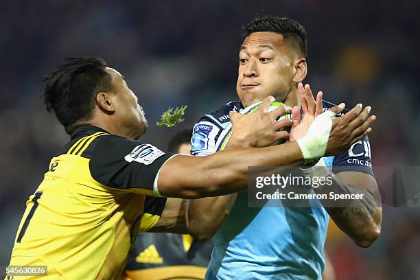 Israel Folau of the Waratahs heads for the tryline during the round 16 Super Rugby match between the Waratahs and the Hurricanes at Allianz Stadium...