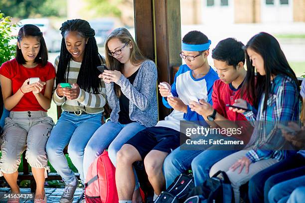texting before class - summer school stock pictures, royalty-free photos & images