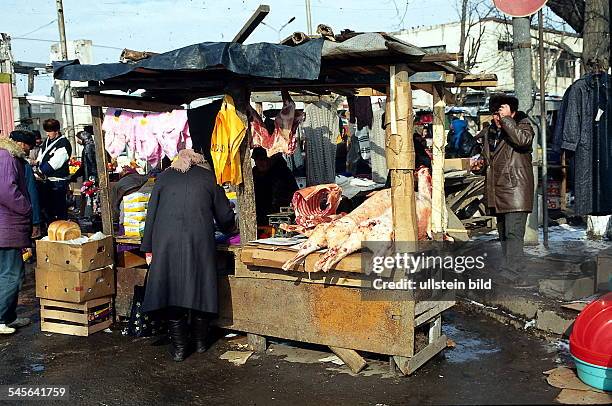 Markt in Grosny :Verkauf von Hammelfleisch.- 1997