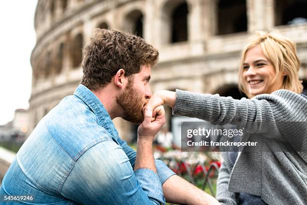 st. valentine dating in rome - kissing hand stock pictures, royalty-free photos & images
