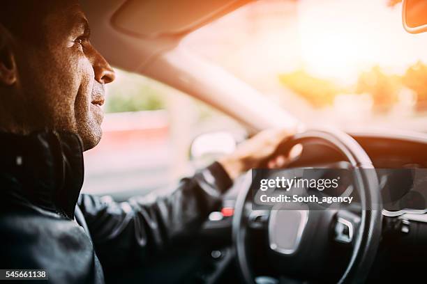 guy in car - airbag stockfoto's en -beelden