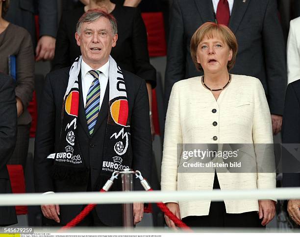 Merkel, Angela - Politician, CDU, Germany, Federal Chancellor - and Horst Koehler, singing the national anthem before the final Germany - Spain at...