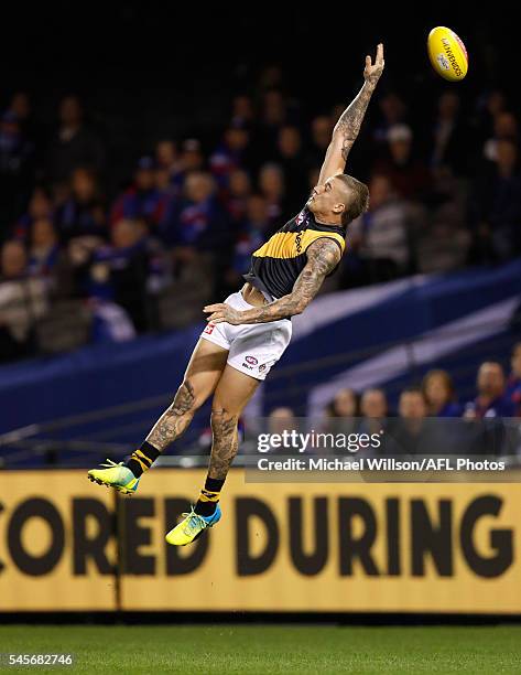 Dustin Martin of the Tigers in action during the 2016 AFL Round 16 match between the Western Bulldogs and the Richmond Tigers at Etihad Stadium on...