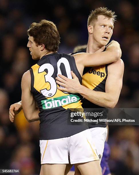 Reece Conca and Jack Riewoldt of the Tigers celebrate during the 2016 AFL Round 16 match between the Western Bulldogs and the Richmond Tigers at...