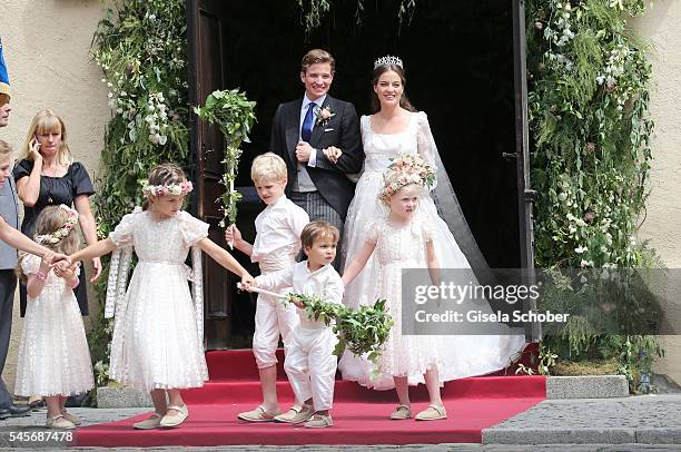 Bridegroom Franz-Albrecht zu Oettingen-Spielberg and his wife Cleopatra zu Oettingen-Spielberg leave the church after the wedding of hereditary...