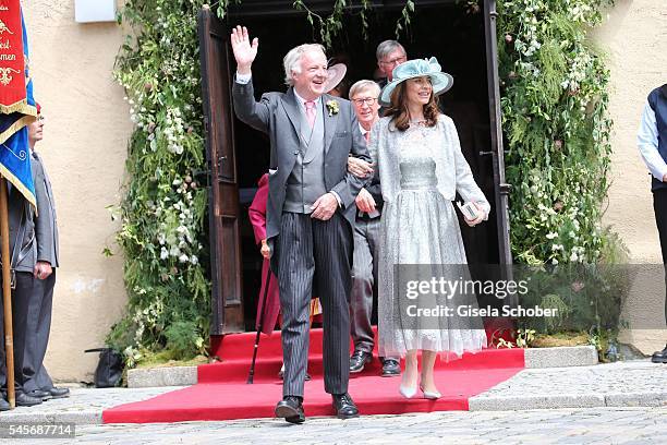 Louis von Adelsheim and his wife Lillian-Elena Baettig-Rodriguez, parents of the bride Cleopatra zu Oettingen-Spielberg during the wedding of...