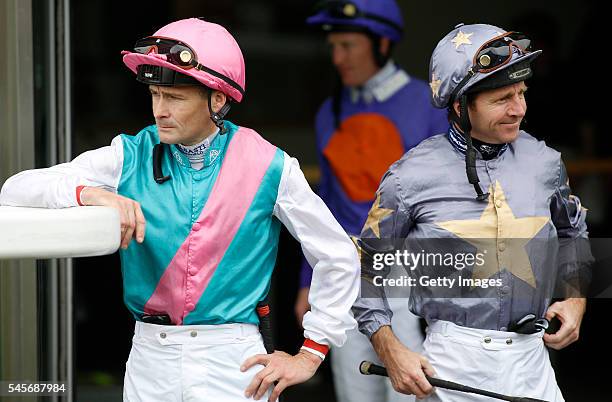 Pat Smullen and Jimmy Fortune head out to ride in The Fred Cowley MBE Memorial Summer Mile Stakes Race run at Ascot Racecourse on July 9, 2016 in...