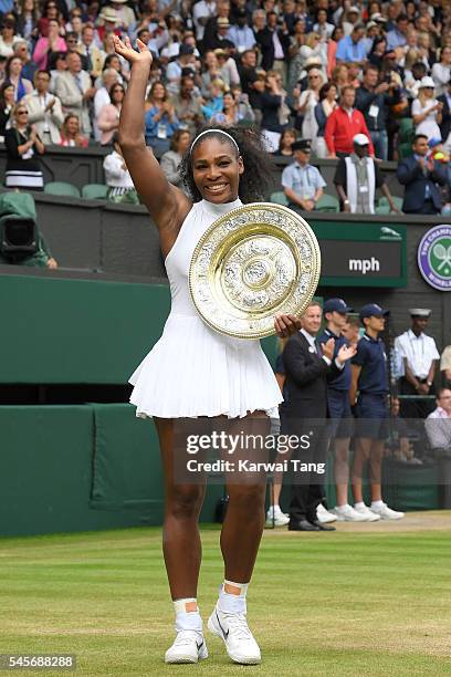 Serena Williams with the winners trophy after defeating Angelique Kerber in the women's final of the Wimbledon Tennis Championships at Wimbledon on...