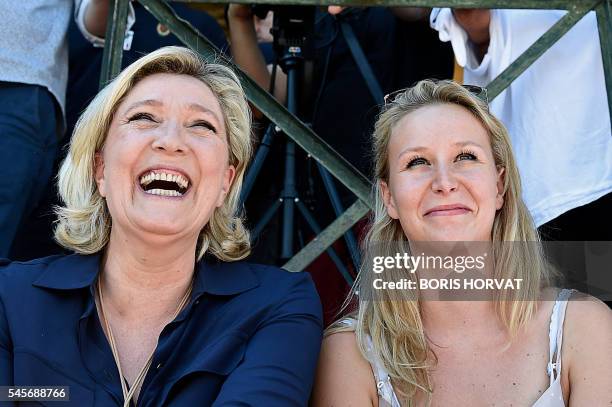 French far-right party Front National President and member of the European Parliament, Marine Le Pen and FN party member of parliament Marion...