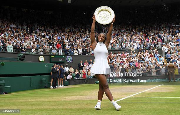 Serena Williams with the winners trophy after defeating Angelique Kerber in the women's final of the Wimbledon Tennis Championships at Wimbledon on...