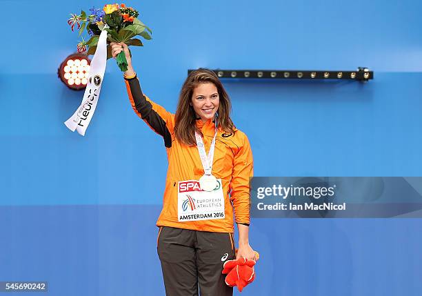 Marlou van Rhijn of The Netherlands celebrates with her medal after winning gold in the final of the womens T43/T44 200m on day four of The 23rd...