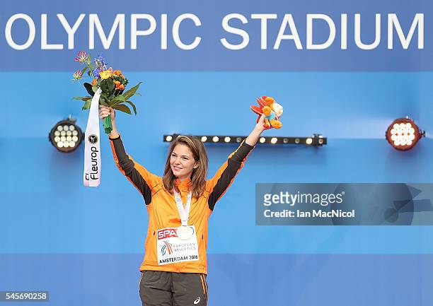 Marlou van Rhijn of The Netherlands celebrates with her medal after winning gold in the final of the womens T43/T44 200m on day four of The 23rd...