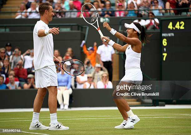 Heather Watson of Great Britain and Henri Kontinen of Finland celebrate victory during the Mixed Doubles Semi Finals match against Oliver Marach of...