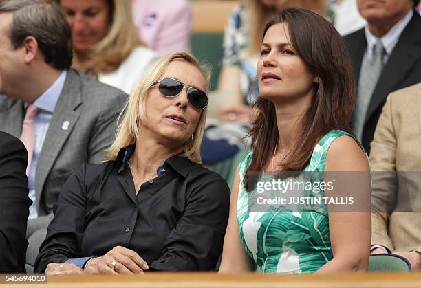 Czech-US former tennis champion Martina Navratilova sits with her wife Russian businesswoman and former model Julia Lemigova in the royal box on...